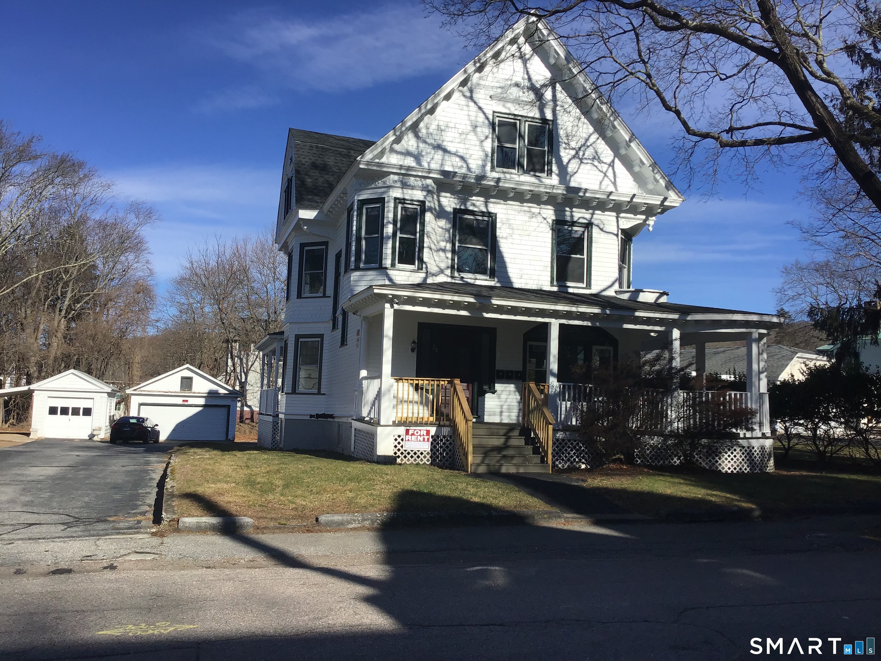 23 Williams Street Norwich, CT 06360 - Photo 1 of 1 a front view of a house with swimming pool
