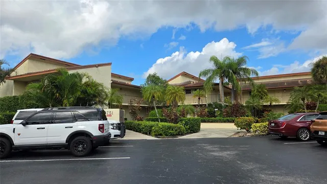 a view of a car in front of a house