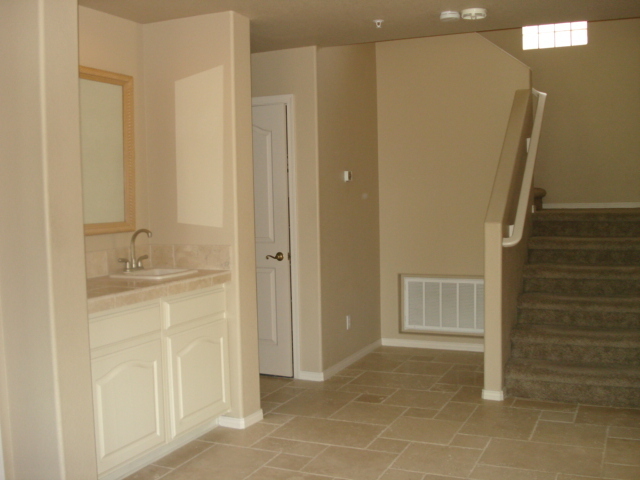 7525 East Gainey Ranch Road, Unit 111 Scottsdale, AZ 85258 - Photo 11 of 38 WET BAR OFF LIVING ROOM
