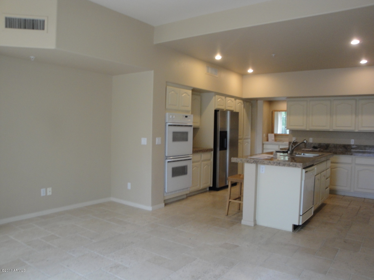 7525 East Gainey Ranch Road, Unit 111 Scottsdale, AZ 85258 - Photo 26 of 38 Family room off Kitchen