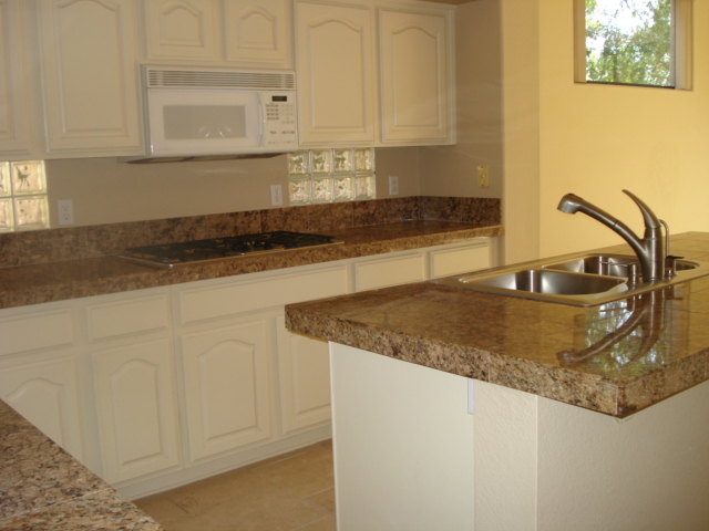 7525 East Gainey Ranch Road, Unit 111 Scottsdale, AZ 85258 - Photo 6 of 38 GRANITE COUNTERS IN KITCHEN