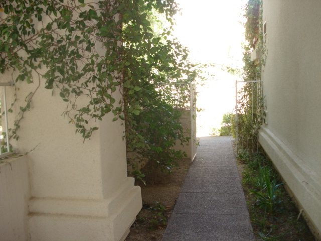 7525 East Gainey Ranch Road, Unit 111 Scottsdale, AZ 85258 - Photo 10 of 38 WALK WAY IN FROM COURTYARD