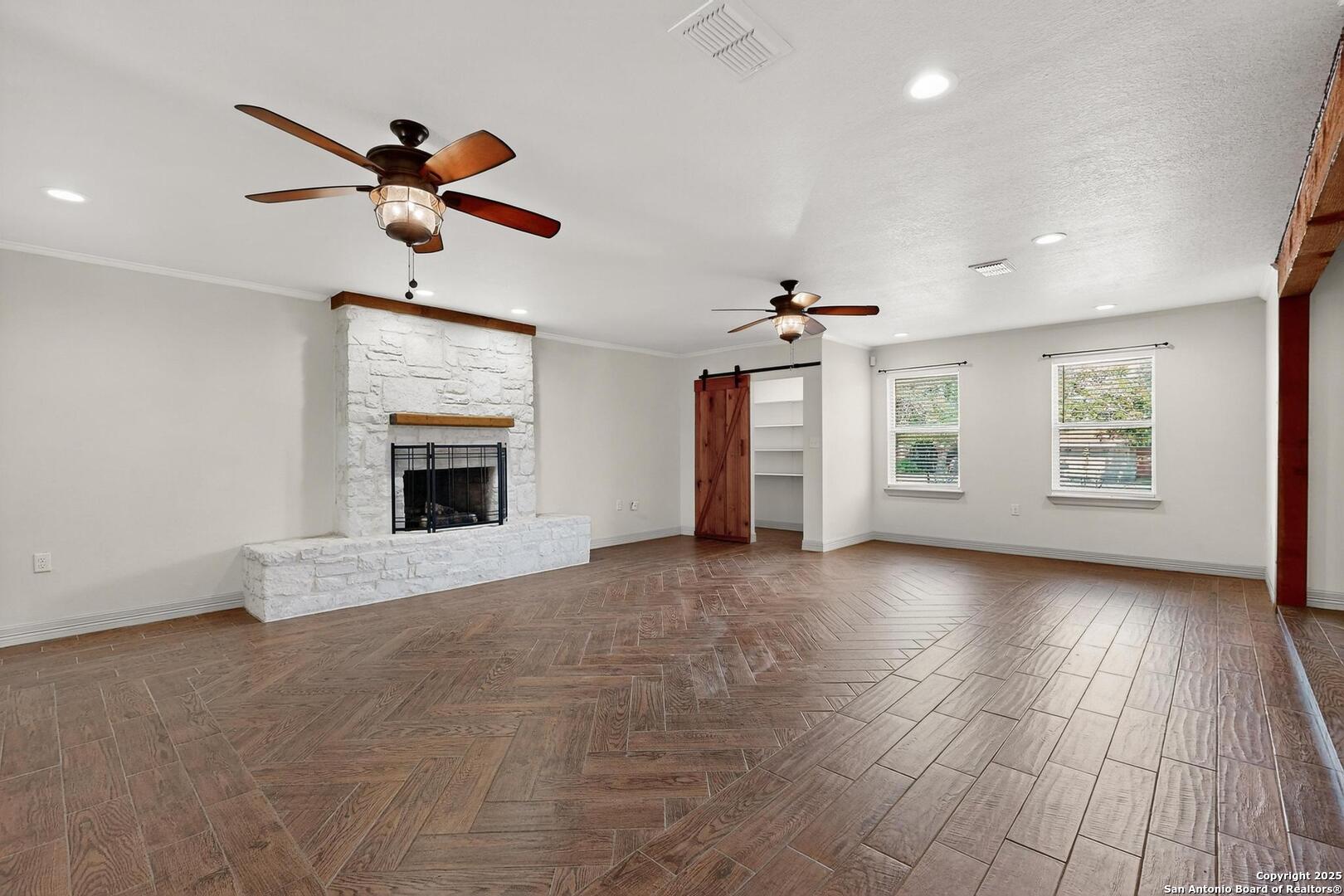 7140 Tree Bend Street China Grove, TX 78263 - Photo 12 of 49 an empty room with windows and fireplace