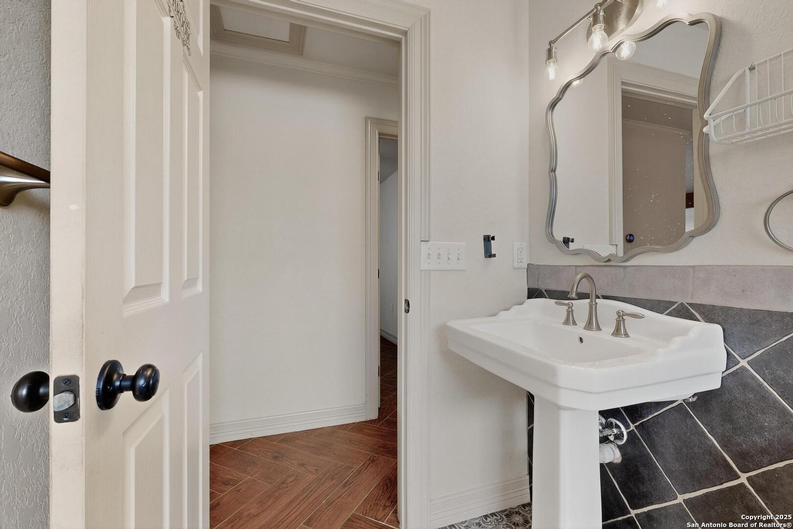 7140 Tree Bend Street China Grove, TX 78263 - Photo 20 of 49 a bathroom with a sink and a mirror