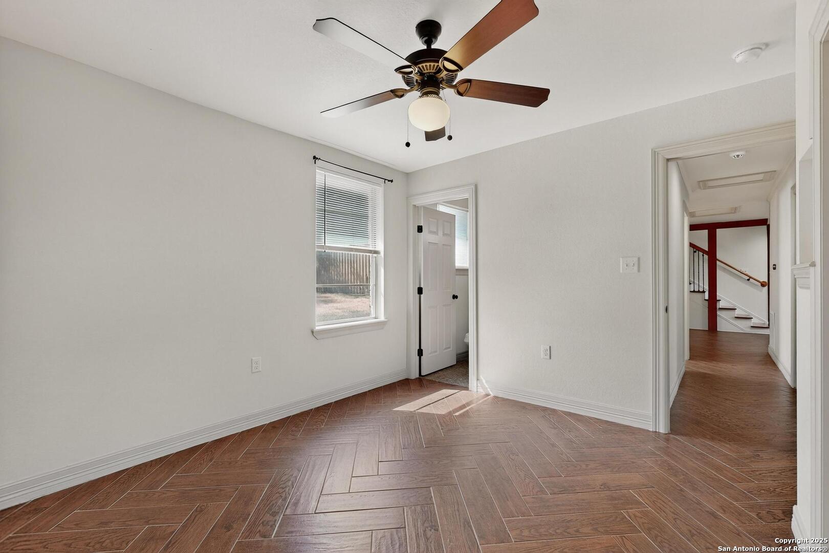 7140 Tree Bend Street China Grove, TX 78263 - Photo 27 of 49 wooden floor in an empty room with a window