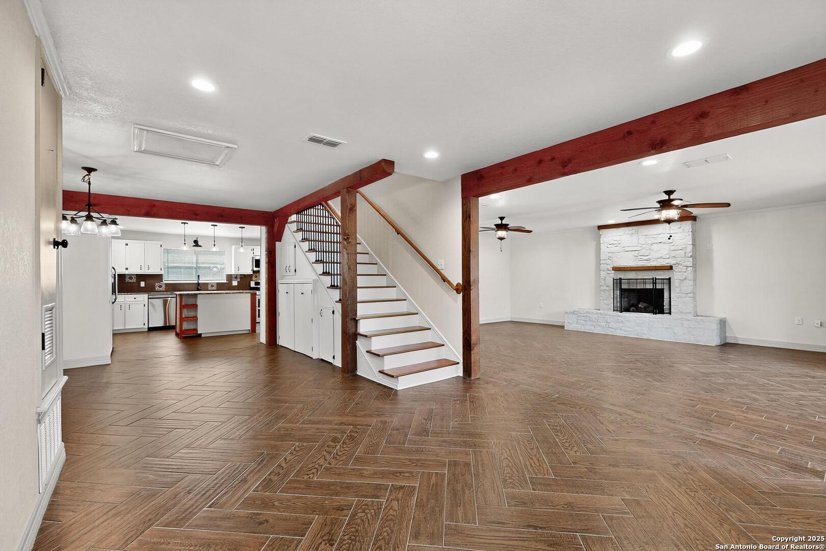 7140 Tree Bend Street China Grove, TX 78263 - Photo 3 of 49 a view of an empty room fire place and a kitchen