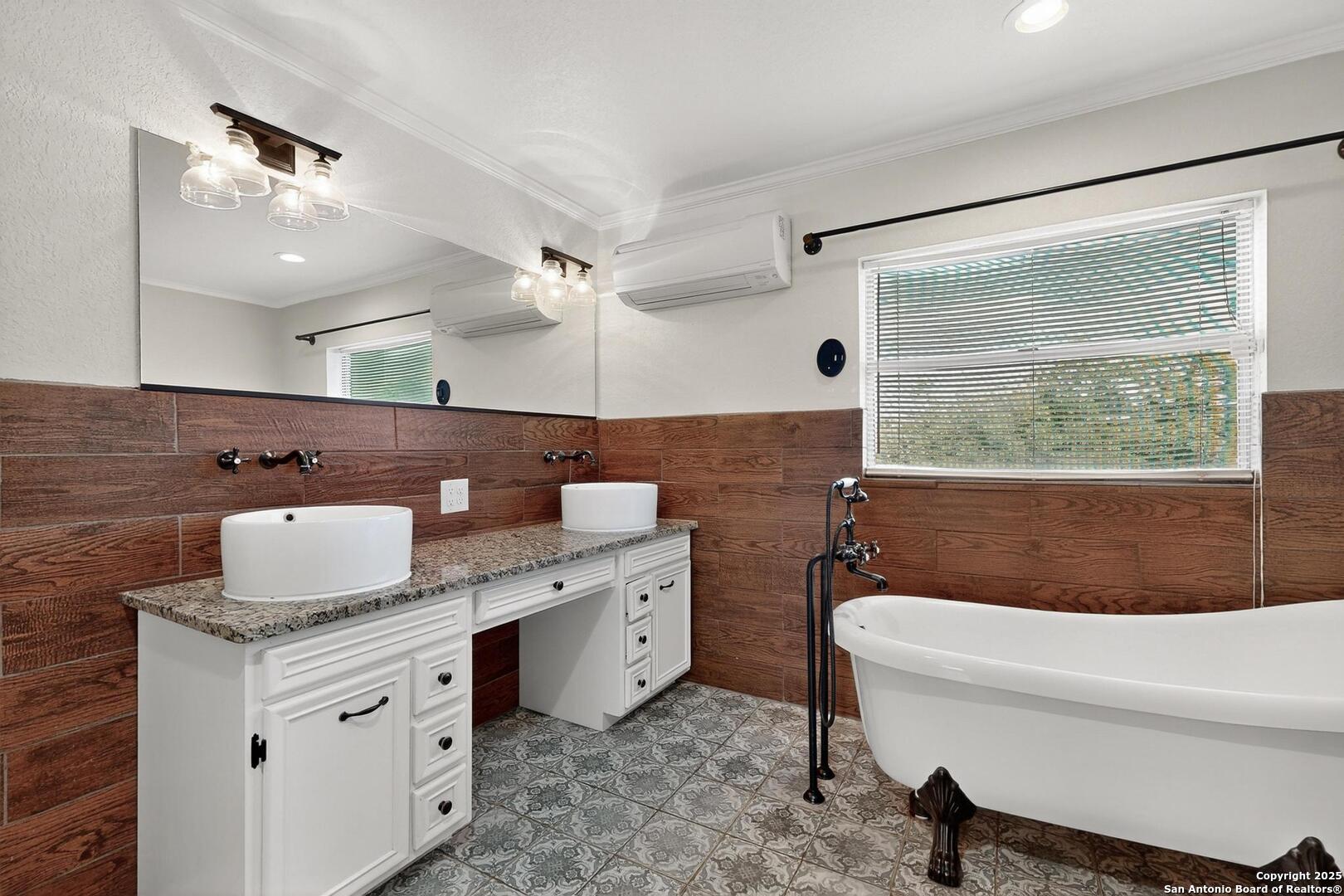 7140 Tree Bend Street China Grove, TX 78263 - Photo 31 of 49 a bathroom with a granite countertop sink mirror vanity and toilet