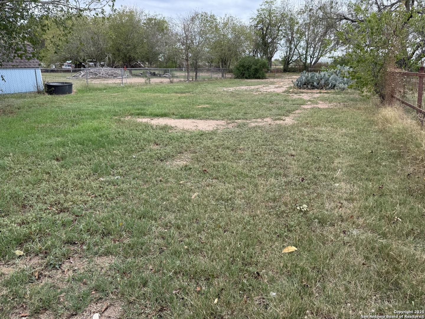 7140 Tree Bend Street China Grove, TX 78263 - Photo 44 of 49 a view of a green field with wooden fence