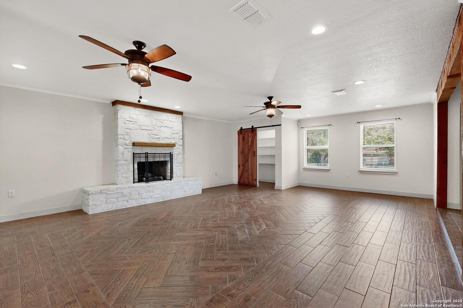 7140 Tree Bend Street China Grove, TX 78263 - Photo 10 of 49 a view of an empty room with a window and fireplace