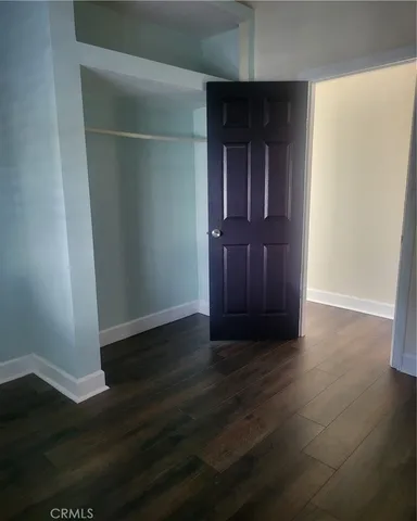 a view of empty room with windows