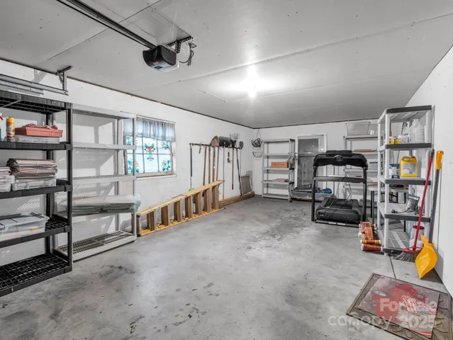 a view of a livingroom with furniture and toys