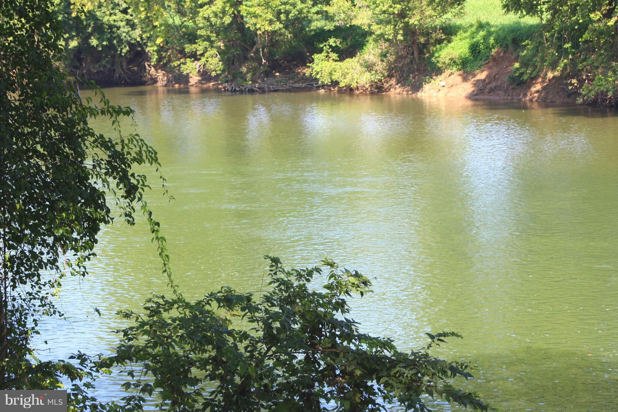 Farms Riverview Road Front Royal, VA 22630 - Photo 10 of 15 a view of a lake with a mountain in the background