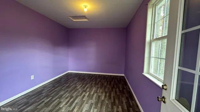 a view of house with backyard outdoor seating and yard