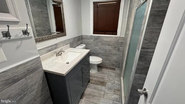 a bathroom with a sink and a toilet