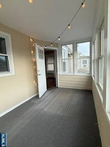 en empty room with windows