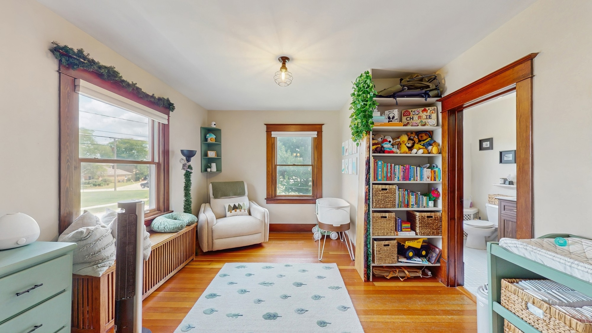 614 McCarthy Road Lemont, IL 60439 - Photo 14 of 37 a bedroom with furniture and a book shelf