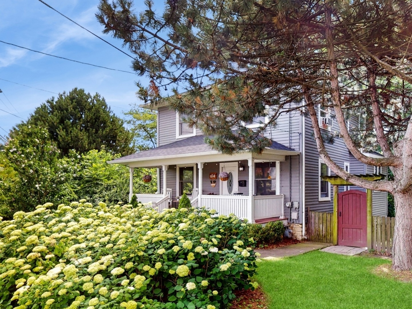614 McCarthy Road Lemont, IL 60439 - Photo 2 of 37 a front view of a house with a yard
