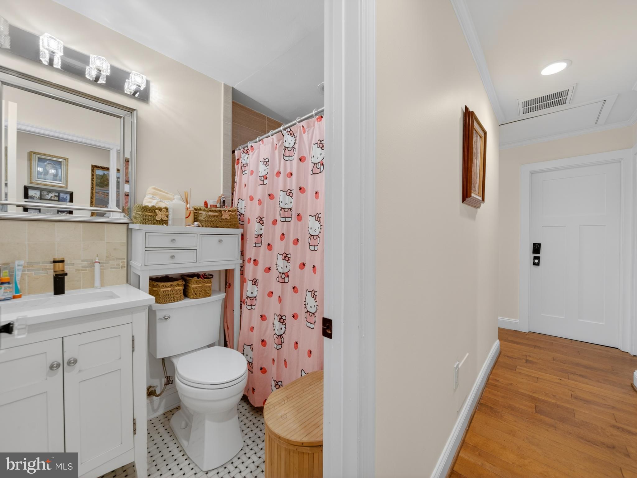 13427 Delaney Road Woodbridge, VA 22193 - Photo 47 of 57 a bathroom with a toilet sink and shower