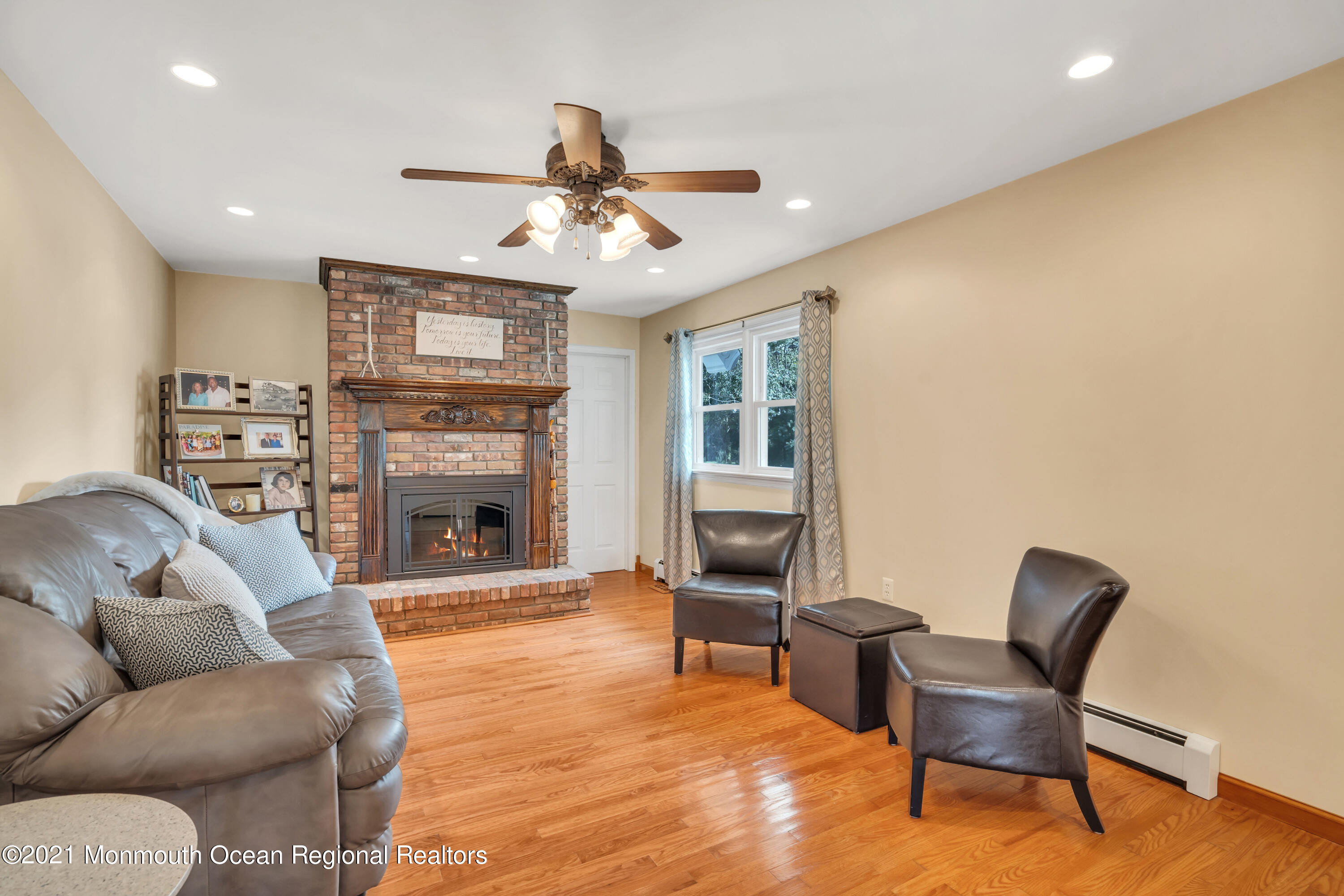 843 Nutswamp Road Red Bank, NJ 07701 - Photo 18 of 92 a living room with furniture and a fireplace