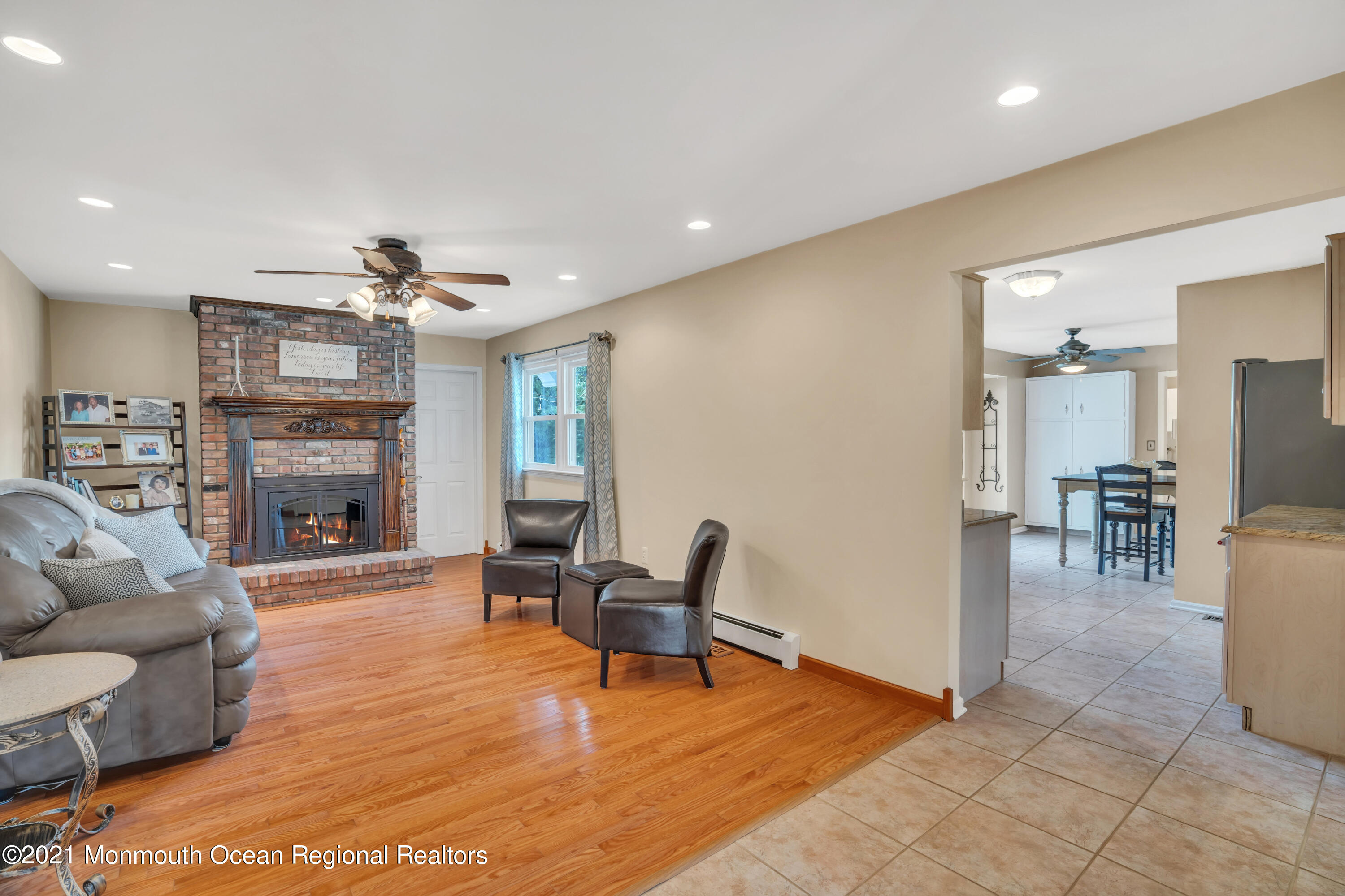 843 Nutswamp Road Red Bank, NJ 07701 - Photo 19 of 92 a living room with furniture and a fireplace