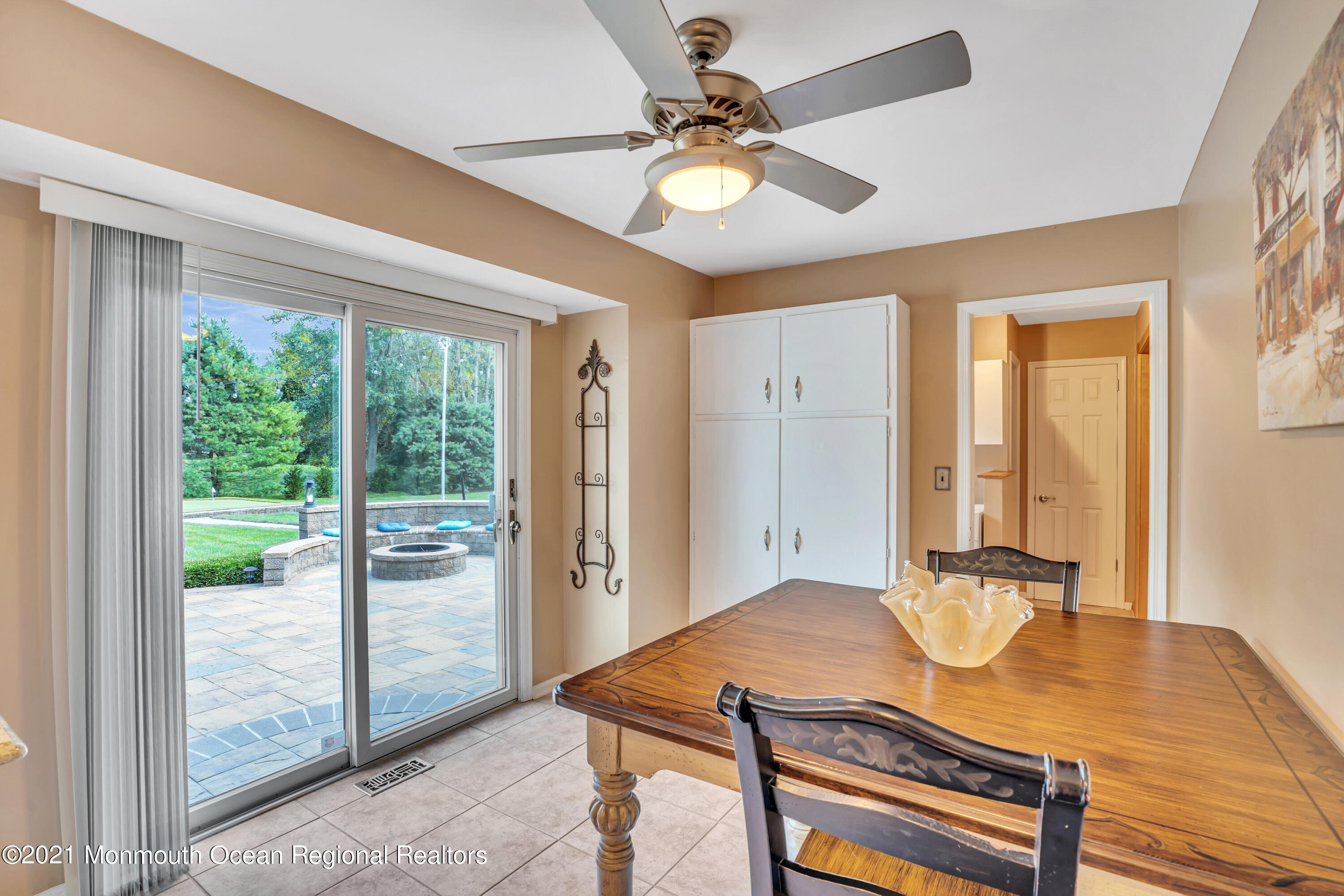 843 Nutswamp Road Red Bank, NJ 07701 - Photo 29 of 92 a view of a workspace with furniture and a window