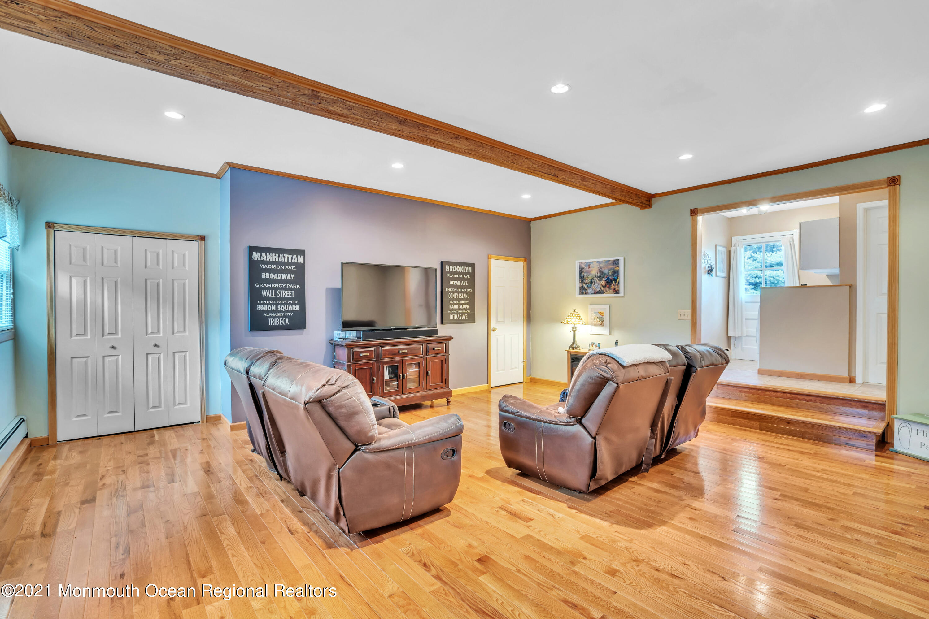 843 Nutswamp Road Red Bank, NJ 07701 - Photo 33 of 92 a living room with furniture and a flat screen tv