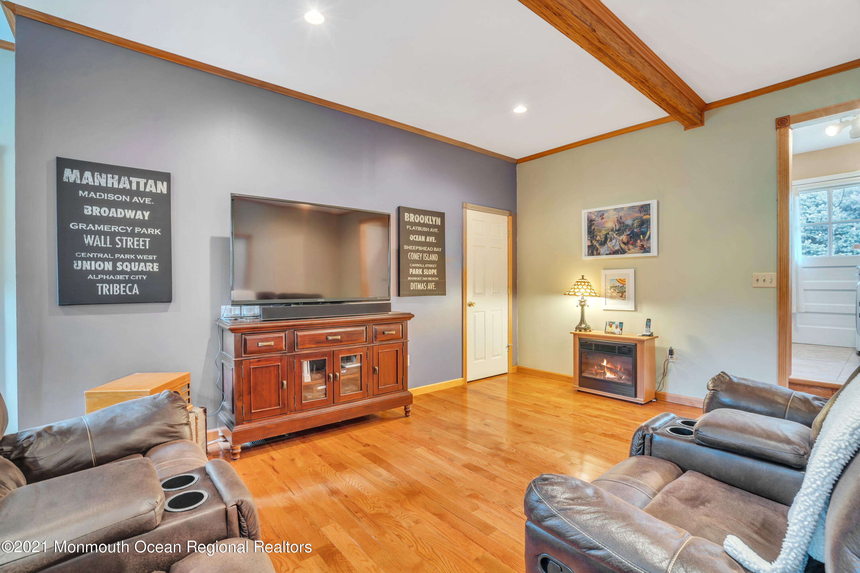 843 Nutswamp Road Red Bank, NJ 07701 - Photo 36 of 92 a living room with furniture and a flat screen tv