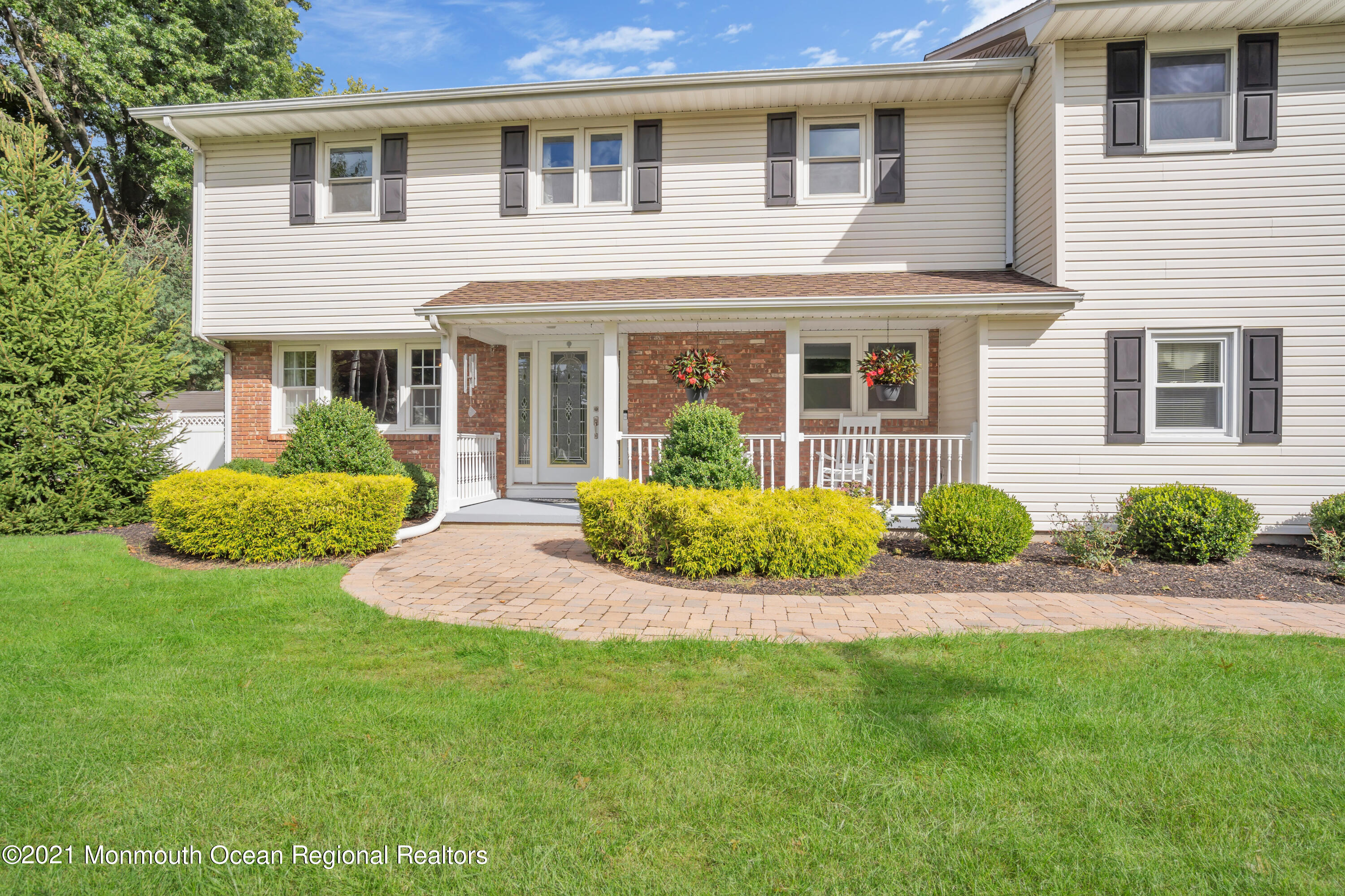 843 Nutswamp Road Red Bank, NJ 07701 - Photo 5 of 92 a front view of a house with a yard