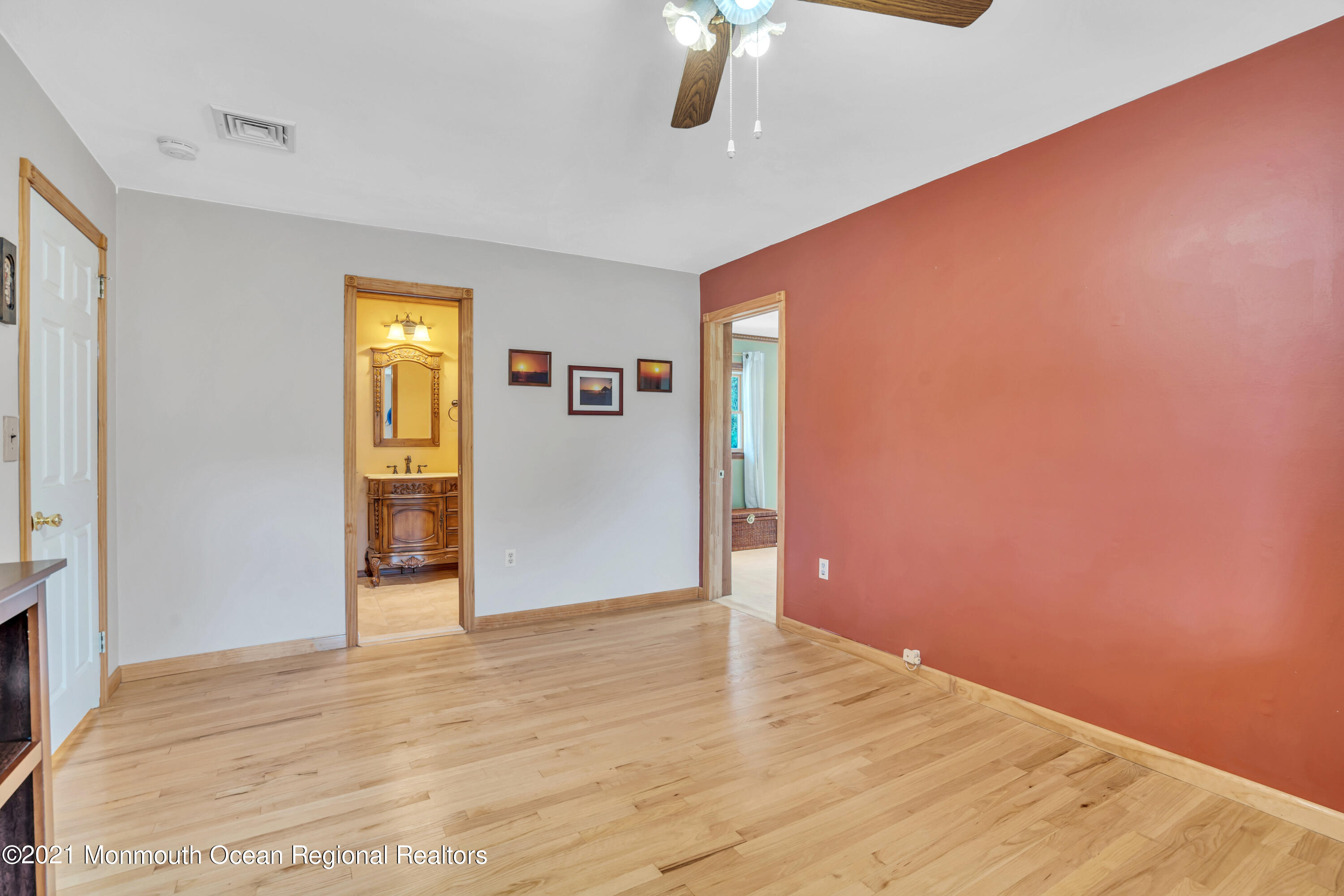 843 Nutswamp Road Red Bank, NJ 07701 - Photo 52 of 92 a view of empty room with wooden floor