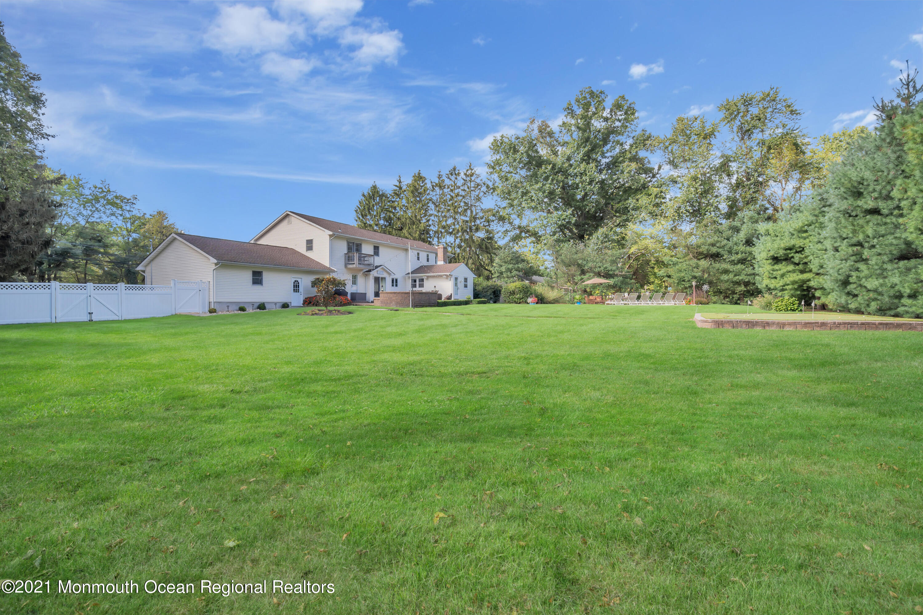 843 Nutswamp Road Red Bank, NJ 07701 - Photo 77 of 92 a view of a house with a big yard and large trees