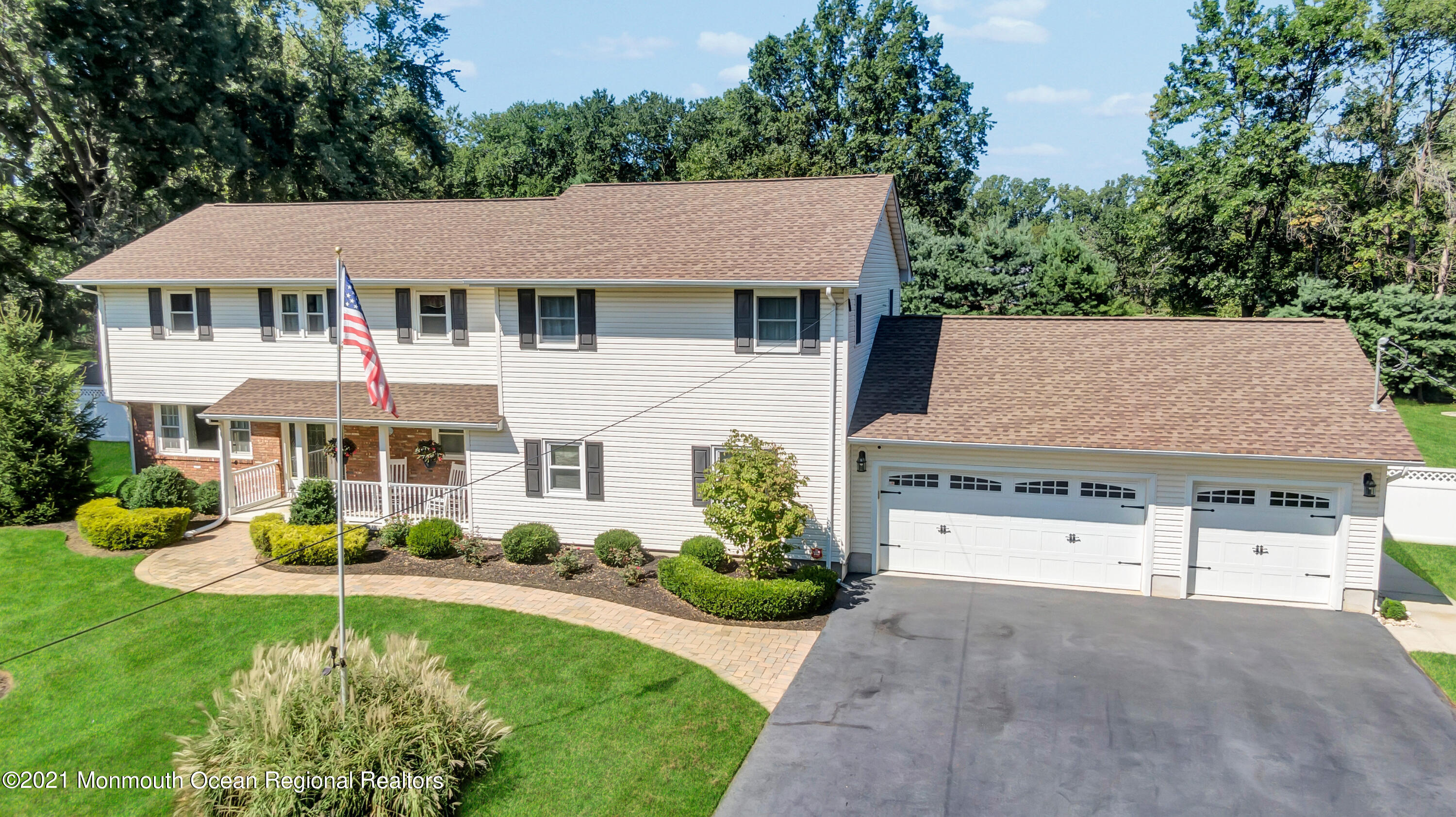 843 Nutswamp Road Red Bank, NJ 07701 - Photo 86 of 92 front view of a house with a yard