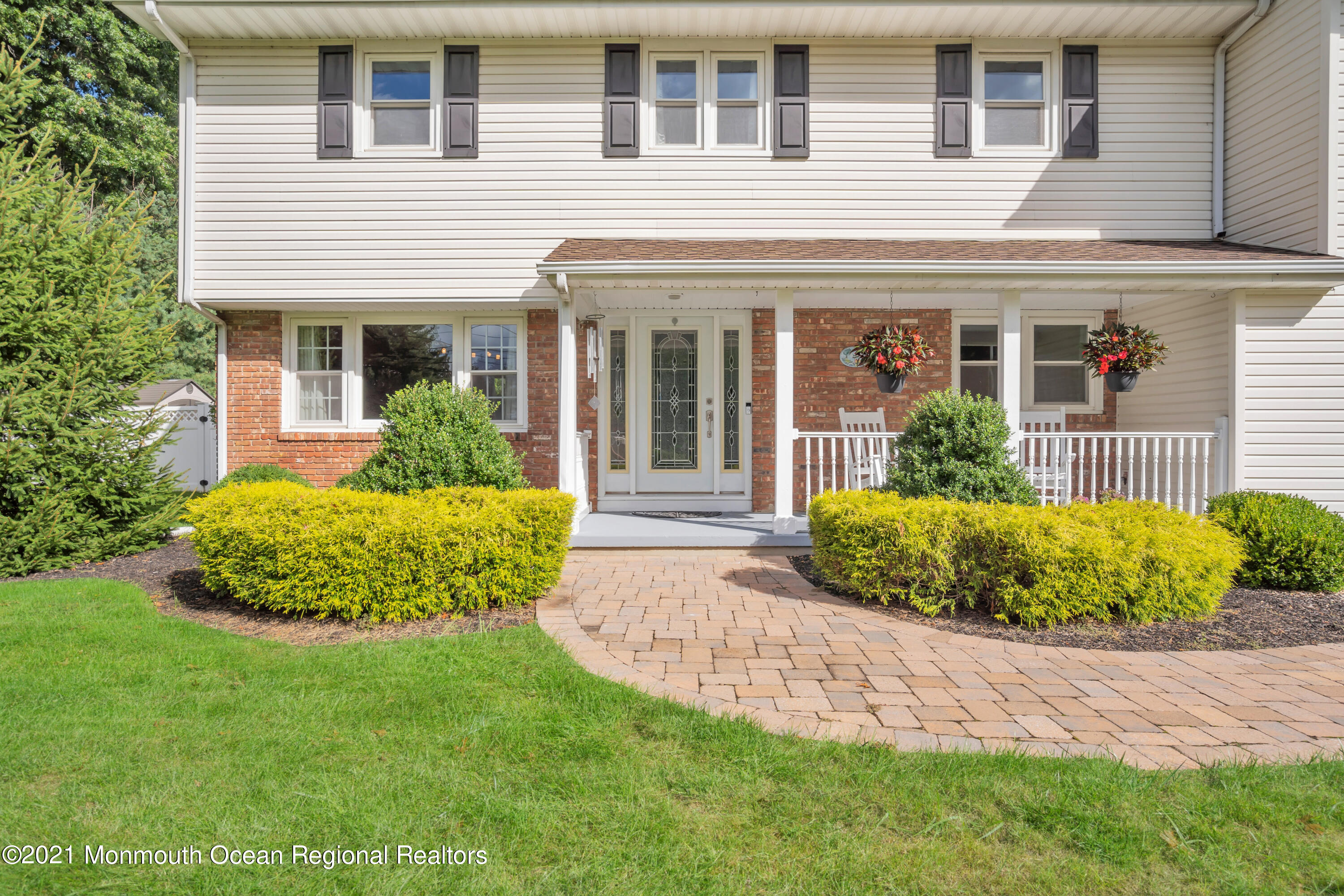 843 Nutswamp Road Red Bank, NJ 07701 - Photo 87 of 92 a front view of a house with garden