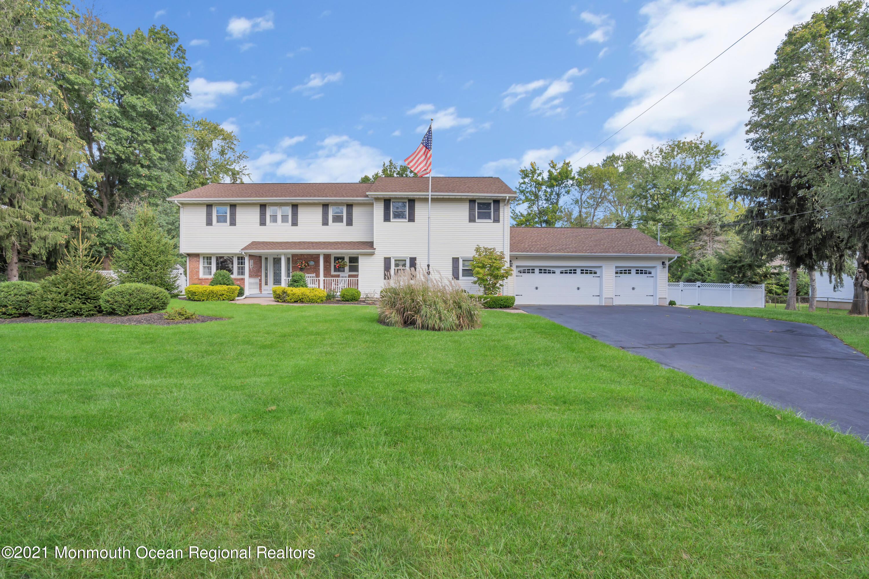 843 Nutswamp Road Red Bank, NJ 07701 - Photo 89 of 92 a front view of a house with garden