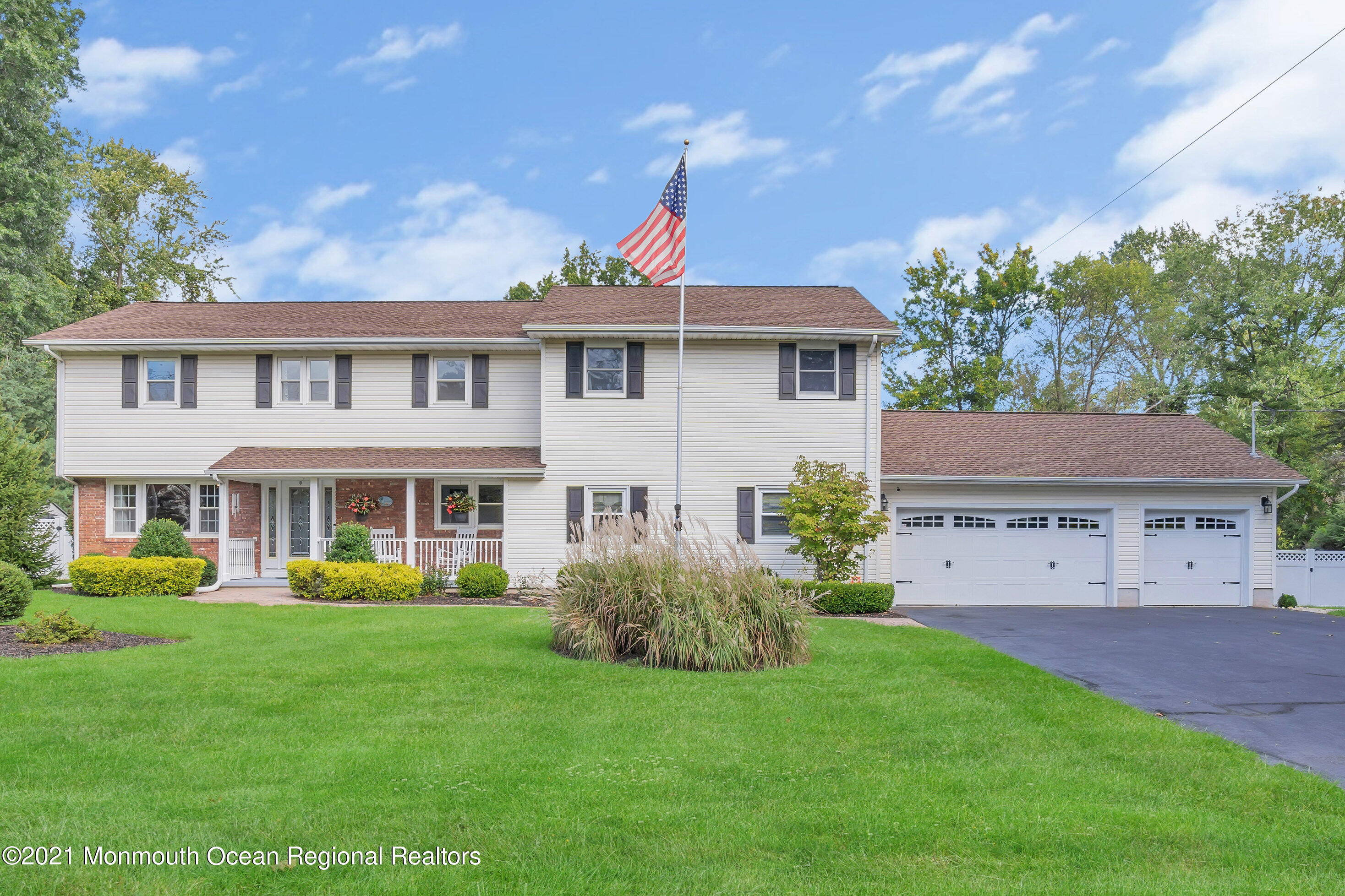 843 Nutswamp Road Red Bank, NJ 07701 - Photo 90 of 92 a view of a house with a yard porch and sitting area