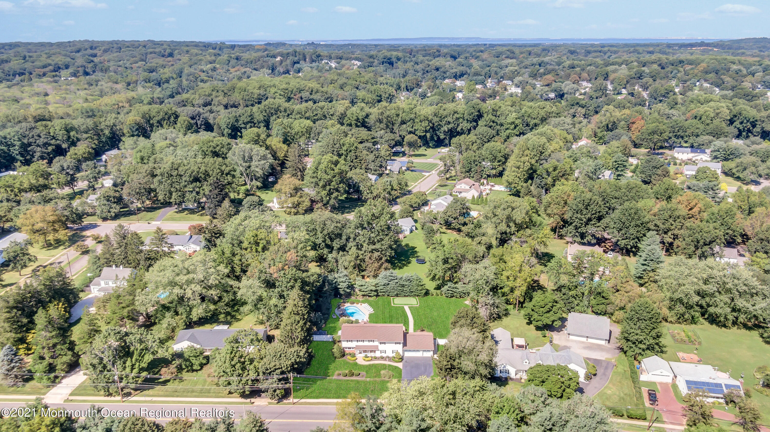 843 Nutswamp Road Red Bank, NJ 07701 - Photo 92 of 92 an aerial view of a city with lots of residential buildings