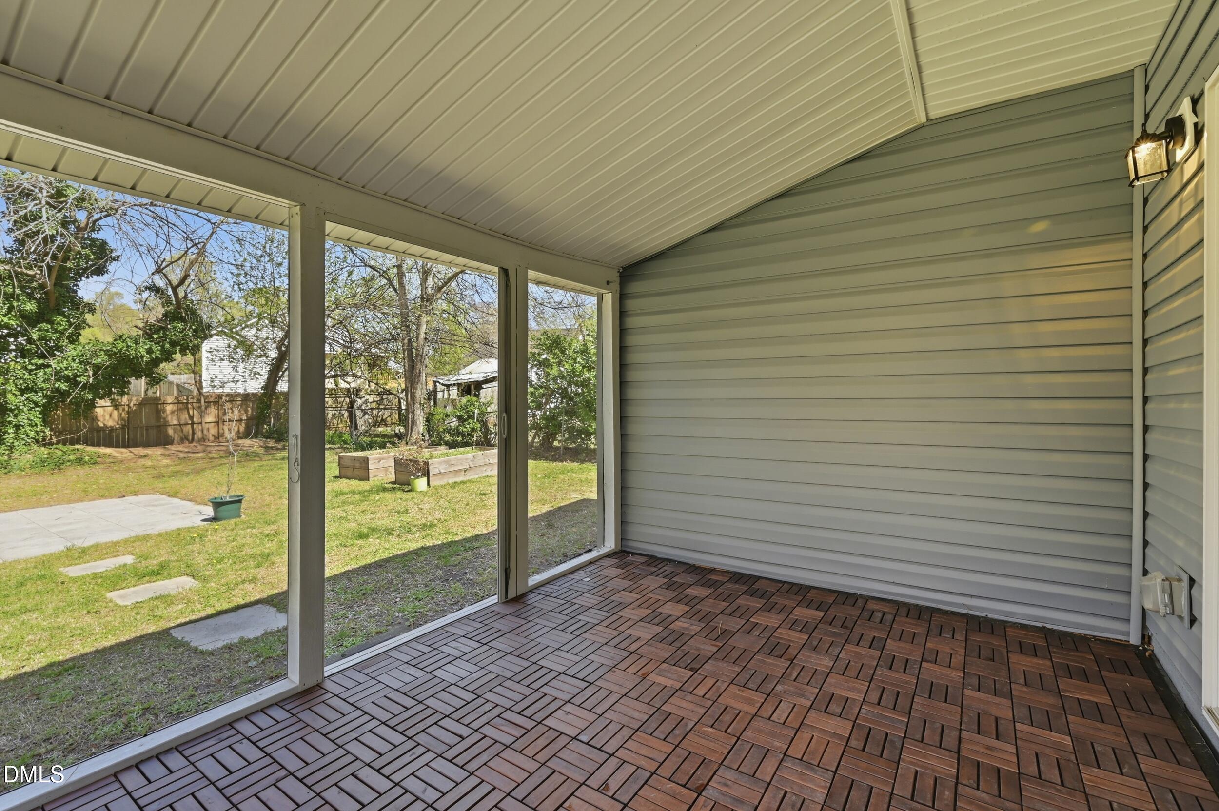 2301 Milburnie Road Raleigh, NC 27610 - Photo 20 of 23 a view of an empty room and window
