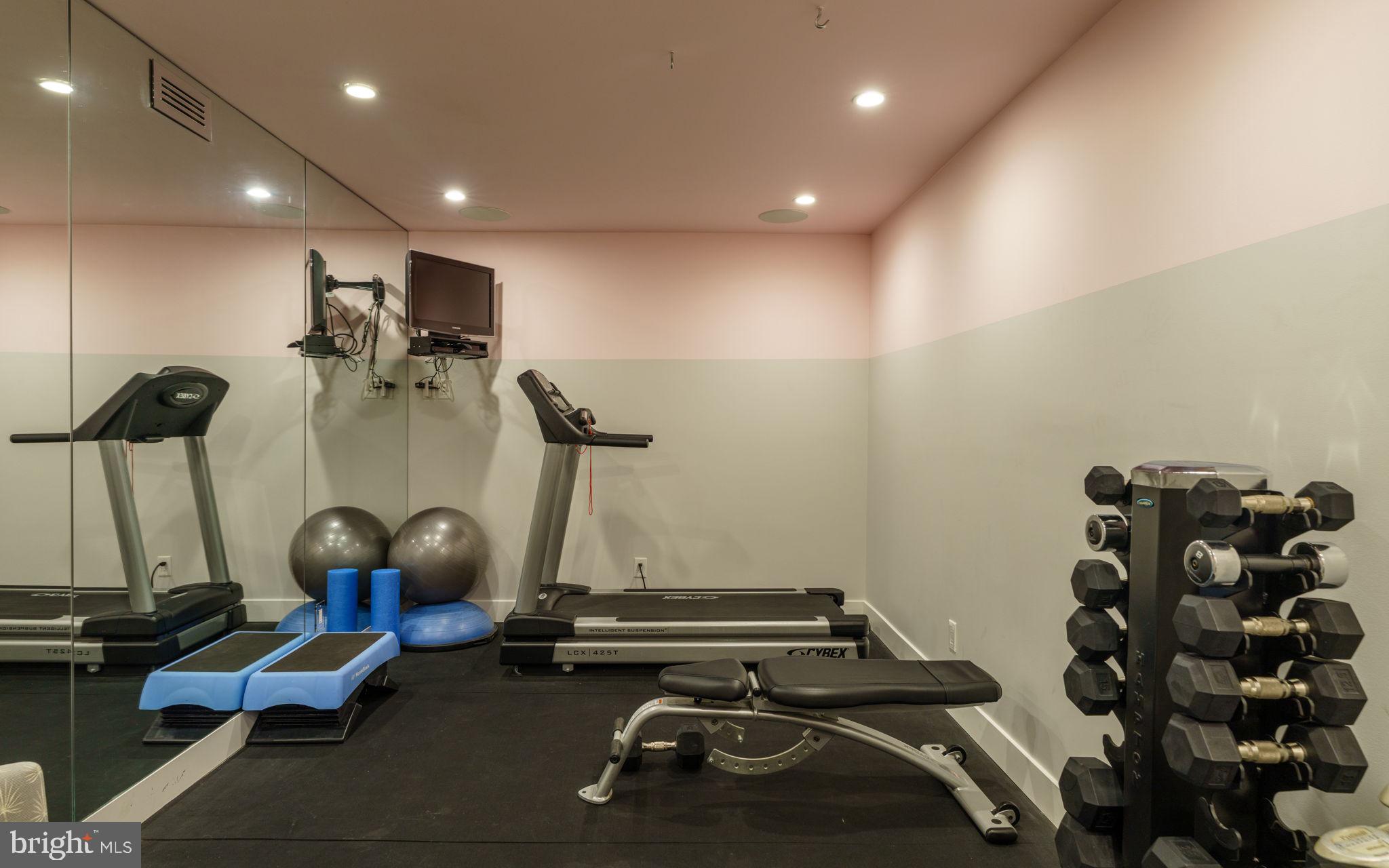136 North 22nd Street Philadelphia, PA 19103 - Photo 23 of 29 a room with gym equipment