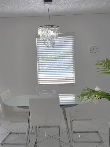 a view of kitchen and chandelier