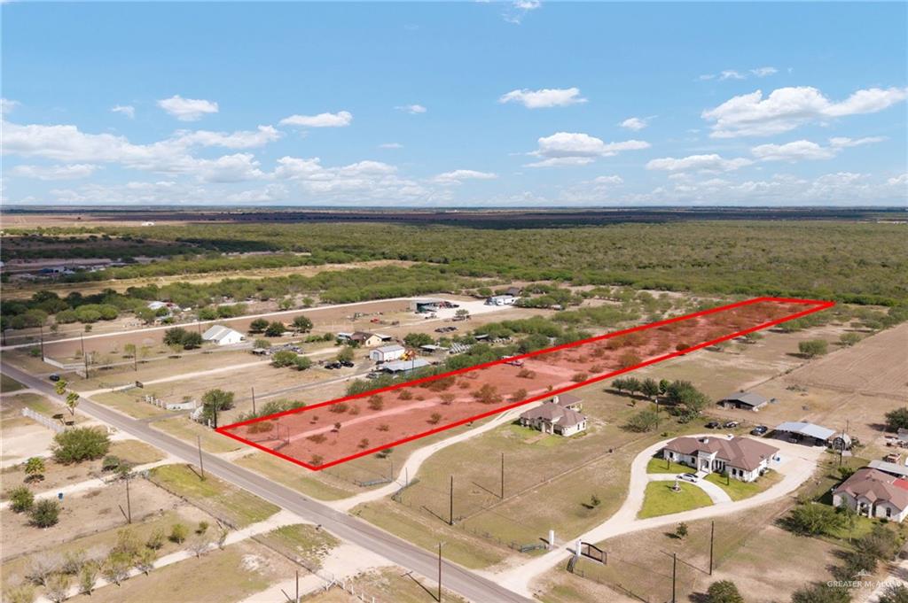 25356 Brushline Road Edcouch, TX 78538 - Photo 5 of 11 Aerial view of sparsely populated area with property boundaries highlighted and a heavily wooded area