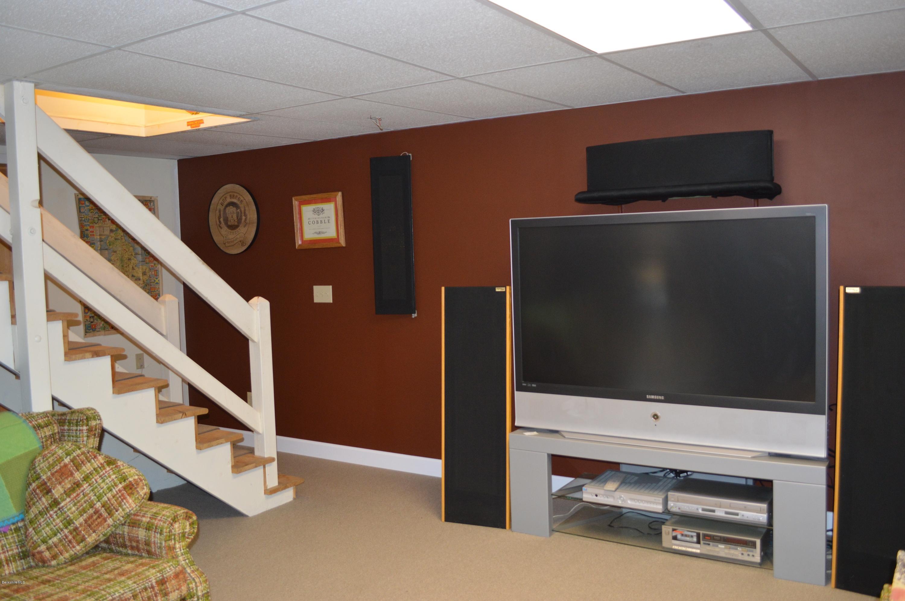 67 Main Road Tyringham, MA 01238 - Photo 18 of 20 a view of an empty room with wooden floor