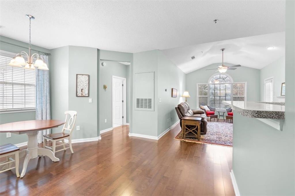 803 Spring Heights Lane Smyrna, GA 30080 - Photo 17 of 40 a living room with furniture and chandelier