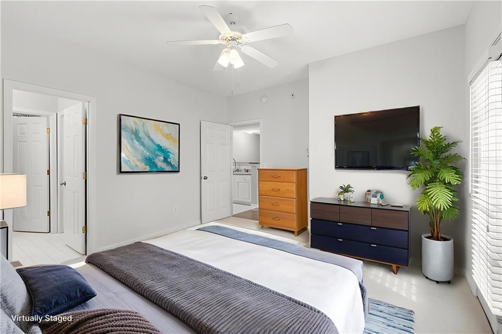 803 Spring Heights Lane Smyrna, GA 30080 - Photo 21 of 40 a bedroom with a bed and a flat screen tv