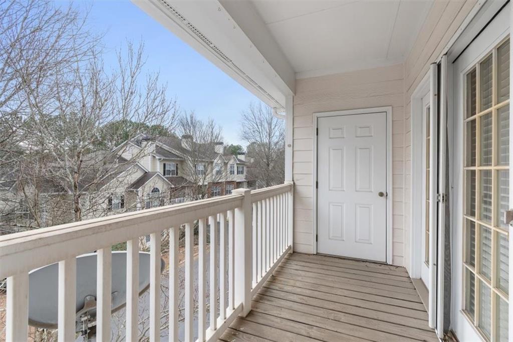 803 Spring Heights Lane Smyrna, GA 30080 - Photo 29 of 40 a view of a balcony with wooden floor