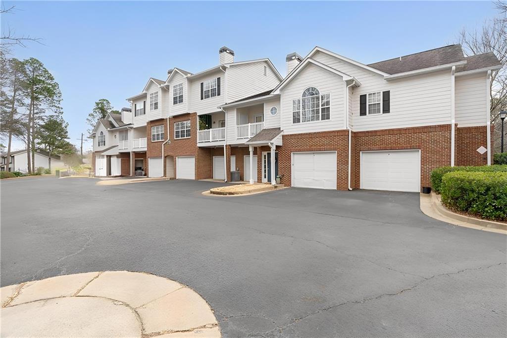 803 Spring Heights Lane Smyrna, GA 30080 - Photo 32 of 40 a front view of a house with a garage
