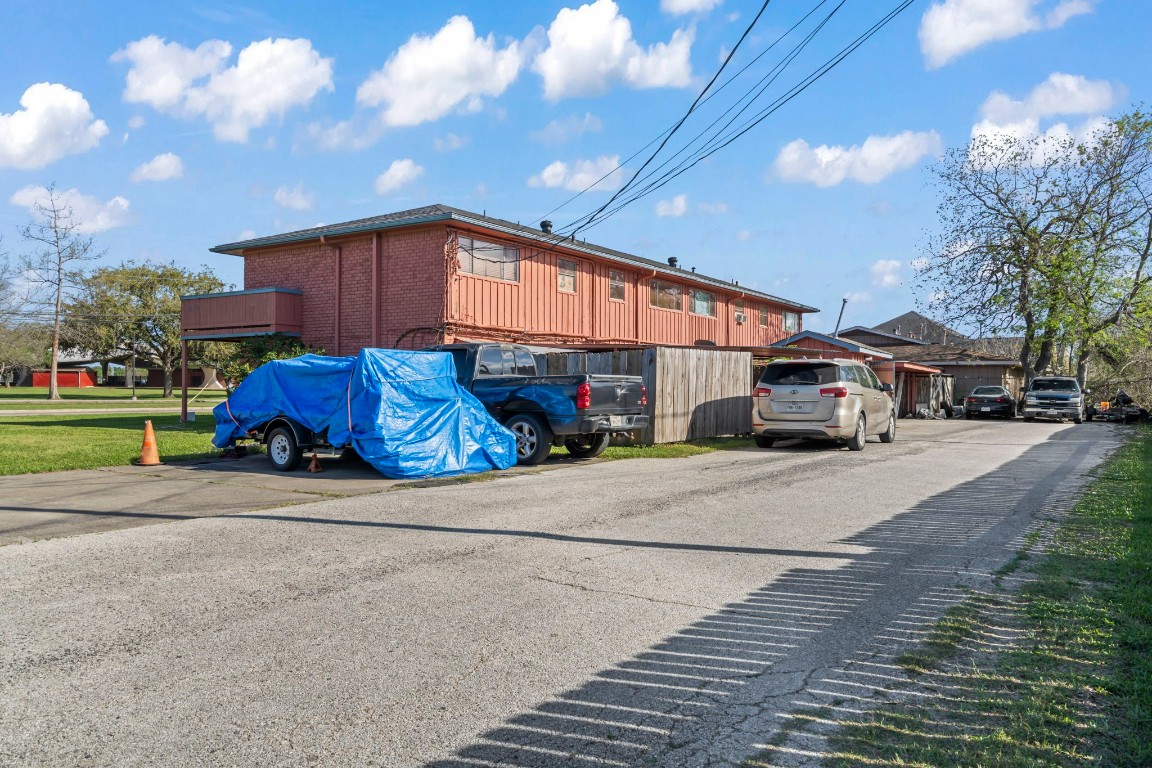 2816 Lafferty Road, Unit 4 Pasadena, TX 77502 - Photo 15 of 34 a car parked on the side of a street
