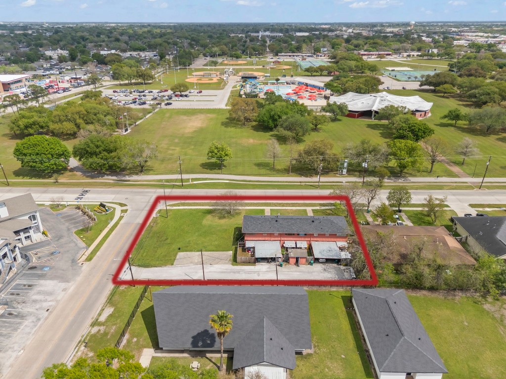 2816 Lafferty Road, Unit 4 Pasadena, TX 77502 - Photo 34 of 34 an aerial view of a swimming pool and lake view