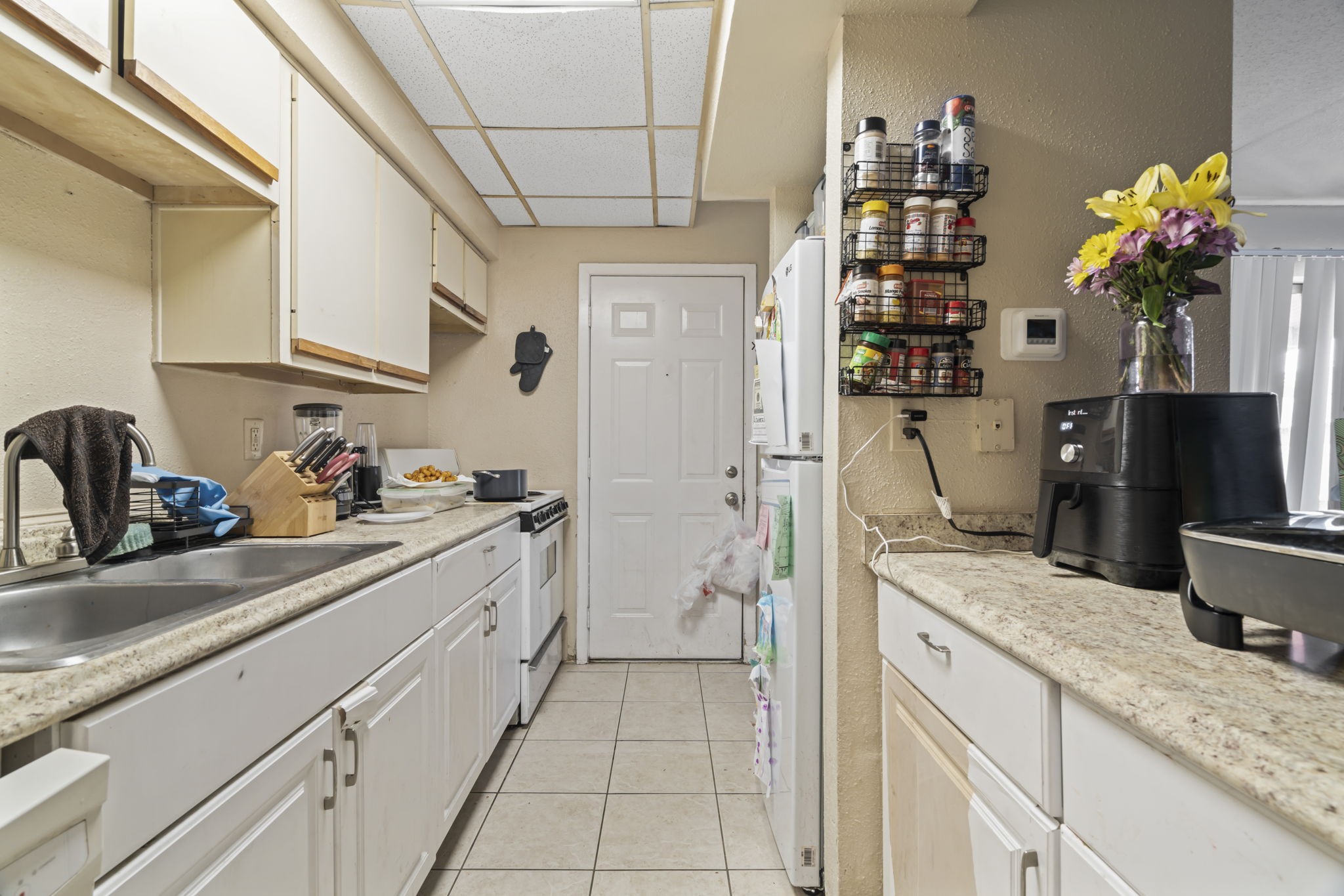 2816 Lafferty Road, Unit 4 Pasadena, TX 77502 - Photo 9 of 34 a kitchen with stainless steel appliances granite countertop a sink and cabinets