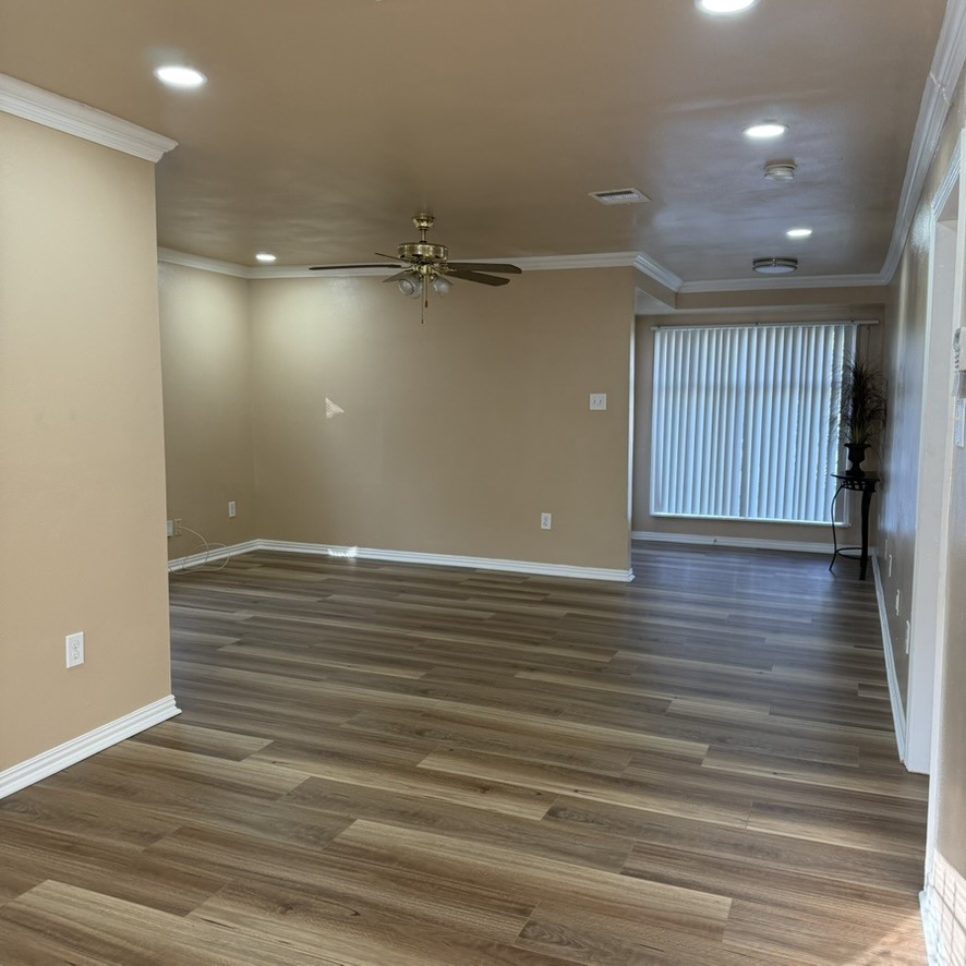 3402 Seabrook Street Houston, TX 77021 - Photo 11 of 18 an empty room with wooden floor