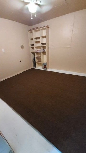 3402 Seabrook Street Houston, TX 77021 - Photo 13 of 18 a view of an empty room with a ceiling fan and window