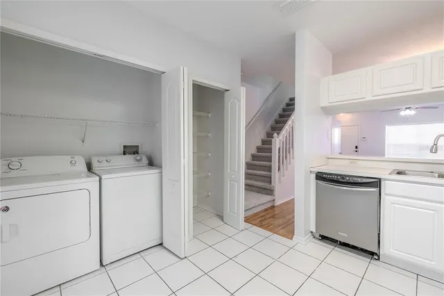 a view of a kitchen with utility and utility room